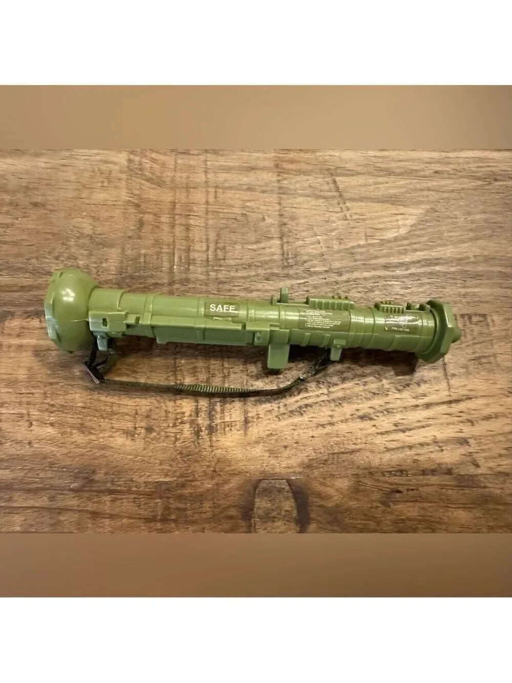 Vintage 1996 G.I. Joe Action Soldier camo painted face. 7” size bazooka launcher